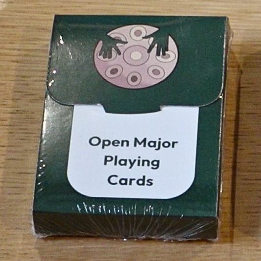 Open Major Handpan Playing Cards deck by Rosie Bergonzi in green packaging on wooden surface