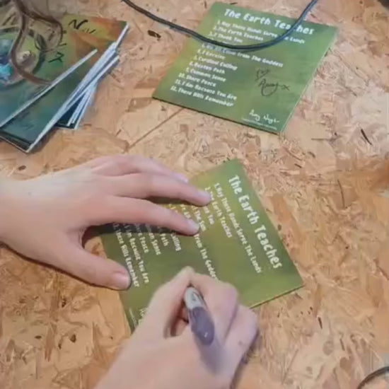 short video of a person signing a cd